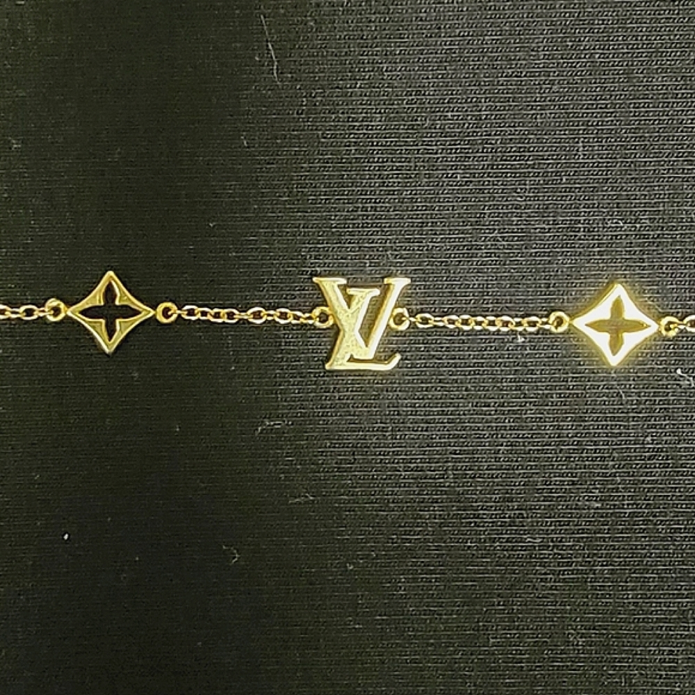 14kt gold vintage LV Louis Vuitton bracelet